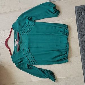 Studio M long sleeve Emerald green top. Never worn. Size M